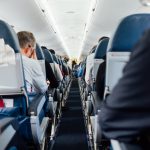 Business class airplane seat with wide space and luxury amenities